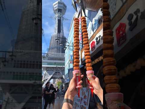 大阪名物の通天閣ベビーカステラ串🗼どれだけグラグラ揺らしても倒れないのがウリらしい！ #大阪グルメ